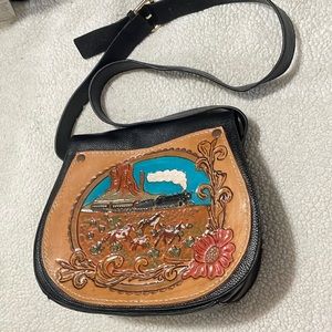 Like new custom hand tooled and painted western horse/train purse